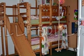 Hochbett mit 2 Betten, Rutschenturm und Tellerschaukel (Hochbett gebraucht) Hochbett mit 2 Betten, Rutschenturm und Tellerschaukel (Hochbett gebraucht)
